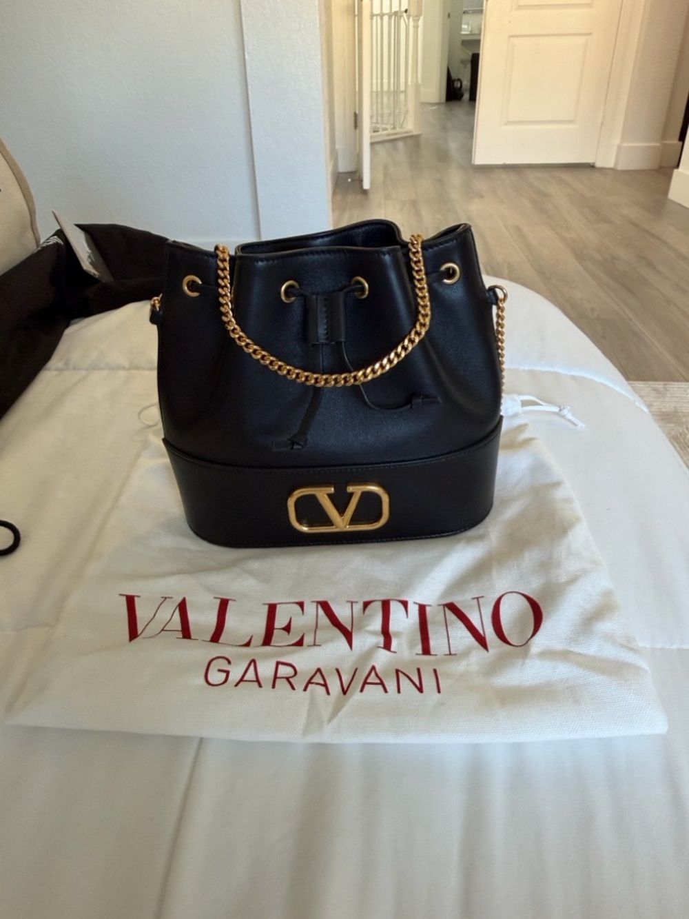 Valentino Garavani Black Leather Bucket Bag with Gold V-Logo